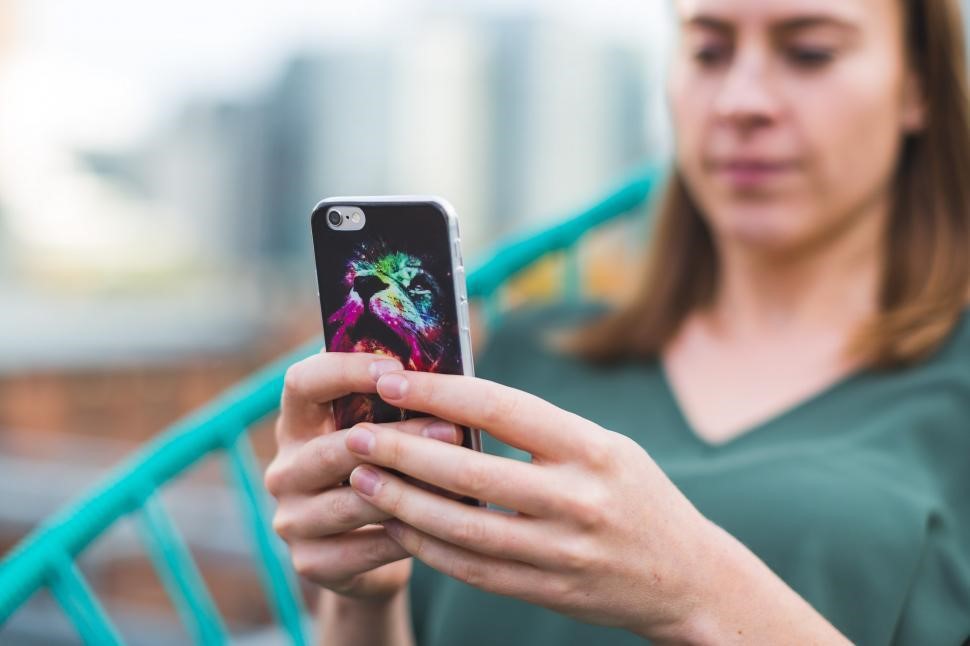 woman-using-smart-phone-with-case.jpg